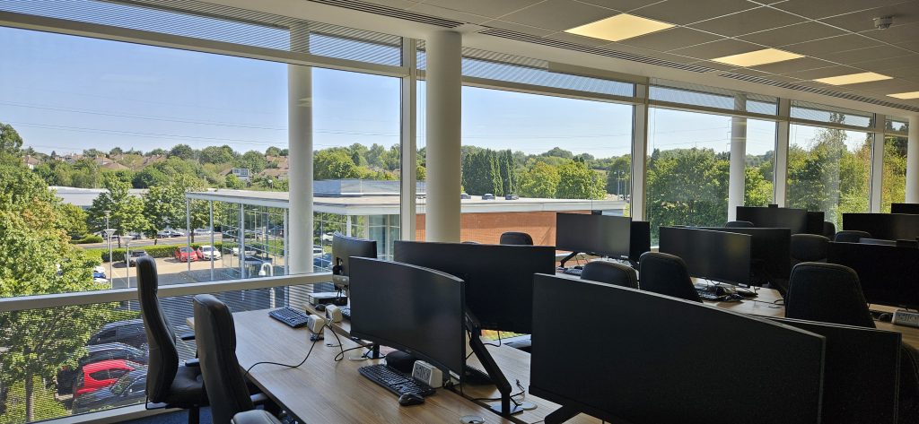 Large open-plan serviced office with floor-to-ceiling windows at The Brentano Suite Elstree, designed for teams of up to 38 people.