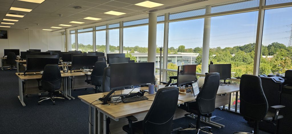Large open-plan serviced office with floor-to-ceiling windows at The Brentano Suite Elstree, designed for teams of up to 38 people.