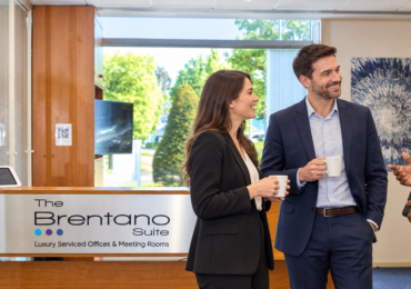 The Brentano Suite Elstree tenants talking in the reception area.